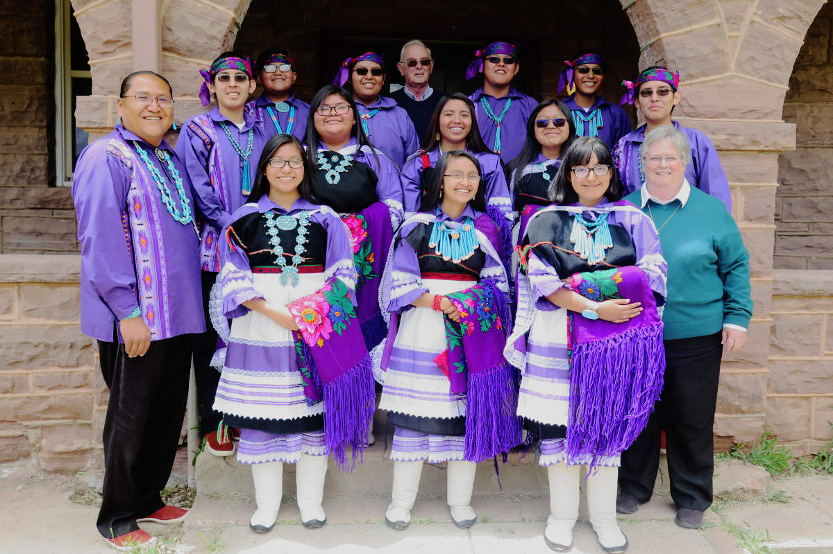 Graduates with Teacher and Principal